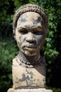 Bust of African female in the Tropical Botanical Garden, Lisbon, Portugal.
