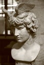 Bust of Antinous as Mercury. Roman sculpture from the mid 2nd century AD. Close-up, sepia