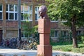 A bust of Boleslaw Prus in front of the school