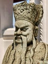 Bust of a chinese stone statue. Royalty Free Stock Photo