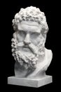Bust of the Farnese Hercules. Heracles head sculpture, plaster copy of a marble statue on black. Son of Zeus Royalty Free Stock Photo