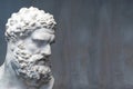 Bust of the Farnese Hercules. Heracles head sculpture, plaster copy of a marble statue. Son of Zeus, the ancient Greek Royalty Free Stock Photo