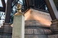 Bust of Gustave Eiffel in front of the Eiffel Tower in Paris, France. Royalty Free Stock Photo