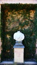 Bust without head in white marble, Horta labyrinth park Royalty Free Stock Photo