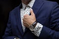 bust of a man in an expensive suit, an expensive watch on his hand, clothes for a businessman Royalty Free Stock Photo