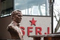 Bust of Marshal Josip broz Tito in front of a SFRJ Socialist Yugoslavia red star.