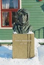 Bust of the polar explorer Roald Amundsen in front of the Polar museum building in Tromso, Norway.