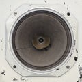 Busted old paper cone audio speaker closeup Royalty Free Stock Photo