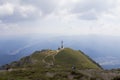 Tourists visiting Heroes Cross on Caraiman peak