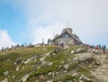 Busteni/Romania - 08.22.2020: Crowded weekend day on Omu Peak, the highest peak in Bucegi Mountains