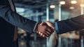 a bustling corporate setting, two businessmen clasp hands in a firm handshake, AI generated Royalty Free Stock Photo