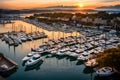 A bustling marina with a variety of boats and sailboats docked, against a backdrop of a picturesque sunset