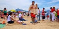 Bustling public beach in the middle of the weekday