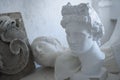 Busts of ancient greek people inside professional art studio