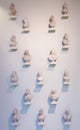 Busts sculptures hanging on wall abstract Royalty Free Stock Photo