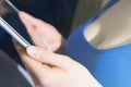 Busty Woman With Blue Tank Top Holding A Blank White Business Tablet Computer In Her Hands Royalty Free Stock Photo