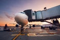 Busy airport at the colorful sunset Royalty Free Stock Photo