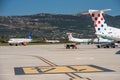 Busy airport scene on a sunny saturday at Split airport Royalty Free Stock Photo