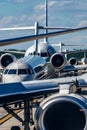 Busy airport tarmac traffic before airplanes take off Royalty Free Stock Photo