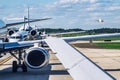 Busy airport tarmac traffic before airplanes take off Royalty Free Stock Photo