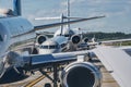 Busy airport tarmac traffic before airplanes take off Royalty Free Stock Photo