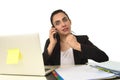 Busy attractive woman in business suit working in stress desperate overwhelmed