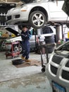 Mechanic under the car