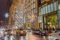 Busy Avenue Outside Trump Tower in New York City. Street Dressed in Christmas Mood with Bright Light Decoration