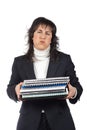 Busy business woman carrying stacked files Royalty Free Stock Photo