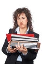 Busy business woman carrying stacked files Royalty Free Stock Photo