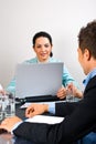 Busy business woman in the middle of meeting Royalty Free Stock Photo