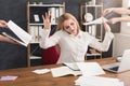 Busy woman in office gesturing stop to assistants
