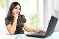Busy business woman working at her office Royalty Free Stock Photo