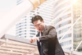 Busy businessman hurrying up to come at meeting on time ,looking on wristwatch on the move,Business concept Royalty Free Stock Photo