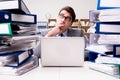 The busy businessman under stress due to excessive work Royalty Free Stock Photo