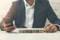 busy businessman using smartphone at office multitasking Royalty Free Stock Photo