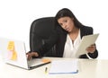 Busy businesswoman suffering stress working at office computer desk worried desperate Royalty Free Stock Photo