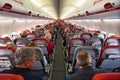 The busy cabin of a Jet2 airplane travelling from Manchester MAN to Madeira FNC