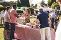 Busy Cake Stall At Summer Garden Fete