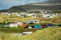 Busy caravan park with many tents, motor homes and caravans, Warm sunny day.