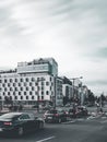 Busy city road with traffic signals and cars in Bordeaux, France.