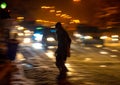 Busy city street people on zebra crossing at night Royalty Free Stock Photo