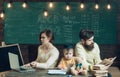 Busy concept. Mother busy of internet surfing in laptop. Father busy reading book. Little child feel bored in busy Royalty Free Stock Photo