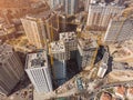 Busy Construction Site and Construction Equipment Aerial Photo at sunset