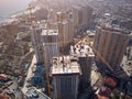 Busy Construction Site and Construction Equipment Aerial Photo at sunset