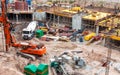 Busy construction site with machinery and workers