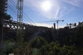 Busy construction site with multiple large cranes working in tandem to construct a building Royalty Free Stock Photo