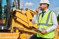 Busy Construction Worker in Suit