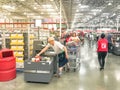 Busy customers at self-checkout kiosks area of Costco in Churchill Way, Dallas