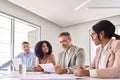 Busy diverse professional business team having discussion at office meeting. Royalty Free Stock Photo